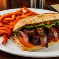 Lomito Sandwhich - Certified Angus Beef · Stir fried protein, onions, cilantro, soy sauce, lettuce, tomatoes, and mayo on a fresh roll...