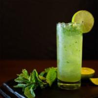 Mojito · Rum, fresh lime juice, sugar, mint, and soda water.