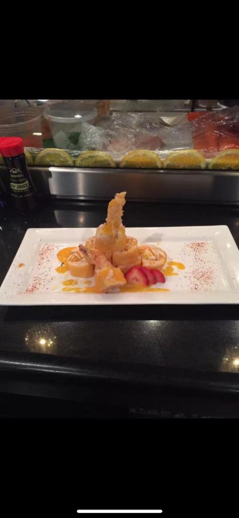 Ocean Roll · Deep fried lobster tail rolled with crab, avocado and masago. Served with special sauce.