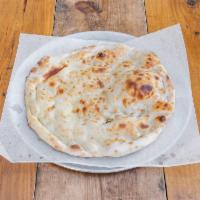 Tandoori Naan · Hot from our clay oven. 

[Nut-Free]