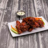 Buffalo Wings · Comes with celery and bleu cheese. Your choice of Mild, Hot, BBQ, or Honey BBQ.