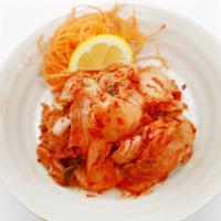 Kimchi · A famous traditional side dish of salted and fermented vegetables, such as napa cabbage and ...