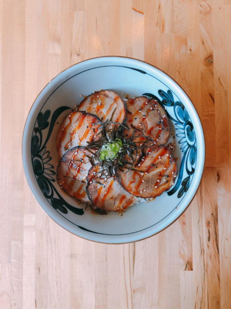 Shashu Don (***New***) · Grilled pork Sha-shu, seaweed and green onion on topped with sesame seed and eel sauce.