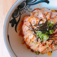 Salmon Donburi Bowl (***New***) · Seared fresh salmon with spicy mayo and eel sauce topped with green onion and seaweed over t...