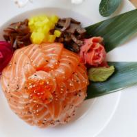 Salmon Don ***(New item)*** · Fresh Salmon topped with ikura over sushi rice with the sides of oshinko, kanpyo, shiitake, ...