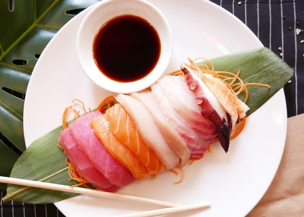 Premium Sashimi · 2 tuna, 2 hamachi, 2 salmon, 2 white fish, 1 octopus and 1 cooked shrimp.