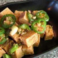 Salt and Pepper Tofu · Non-GMO tofu deep fried in mini cubes then wok tossed with salt and pepper. Vegetarian.
