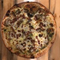 18'' Roasted Potato Pizza · pesto sauce, mozzarella cheese, roasted potatoes, bacon, roasted garlic
