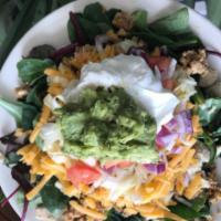 Taco Salad · Greens, corn chips, toppings, choose catalina, balsamic, ranch, or salsa.