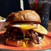 The Farmers Burger · Pickles, potato chips, cheddar, pork belly, bacon, egg, and divine sauce.
