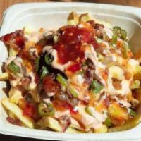 Hot Mess Fries · Fries, Green Chili Cheese Sauce, Sherry Buttered Onions, Roasted Jalapenos, Bacon, Sweet Chi...