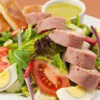 Chef Salad · Our house salad with sliced ham, smoked turkey, provolone cheese and boiled eggs.