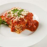 Lasagna · Lasagna with ground beef, tomato sauce, Parmesan, ricotta and mozzarella cheese.
