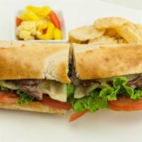Steak and Cheese Sandwich · Beefsteak, grilled onion, provolone cheese, mayo, lettuce and tomatoes.