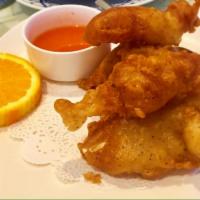 Deep Fried Calamari · Crispy calamari, served with sweet and sour sauce.