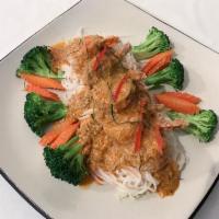 Prawns Chao Talay · Steamed prawns topped with house made creamy curry sauce with Thai noodles and vegetables.