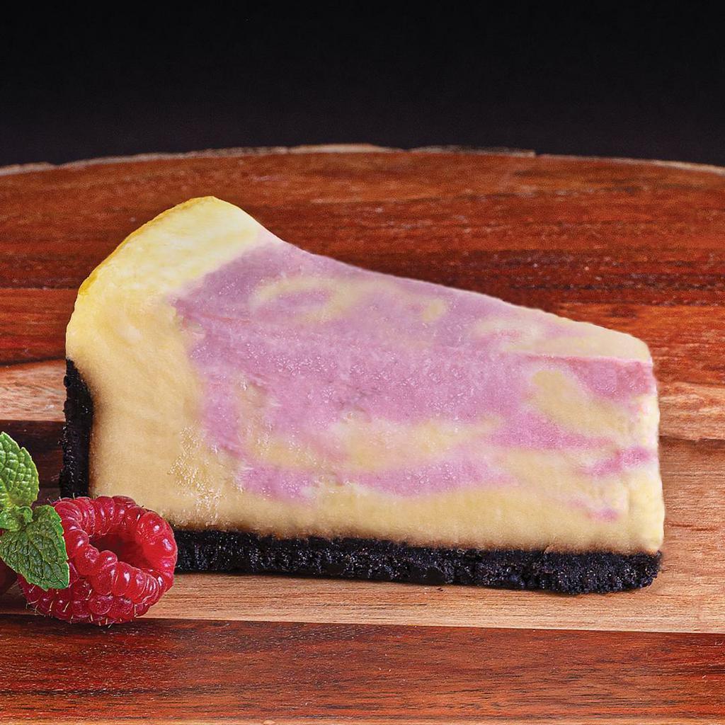 Raspberry Swirl Cheesecake · A creamy raspberry swirl cheesecake on a chocolate crumb crust from Cheesecake Factory. Single slice serving.