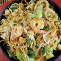 Seafood Yakisoba · Shrimp, scallops, calamari, marinated with Zencu yakisoba sauce stir-fried with cabbage, oni...