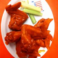 Leona's Classic 15 Minute Jumbo Wings · Jumbo whole chicken wings coated in Buffalo sauce and served with ranch or blue cheese dress...