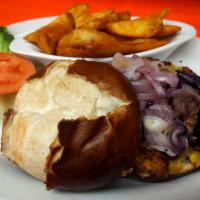 Vegetarian Burger · Roasted veggie patty grilled and topped with roasted red onions, cheddar cheese and chipotle...