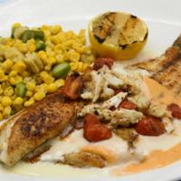 Blackened Redfish · Topped with Maque Choux & Smoked Tomato Crab Butter