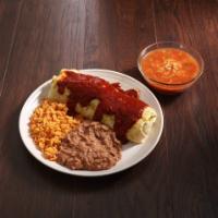 Al Pastor Burrito · Carnitas marinated in a chile guajillo pastor style sauce with fresh diced onion and cilantr...