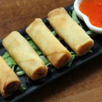 4 Piece Harumaki Spring Rolls · Rice paper or crispy dough filled with shredded vegetables.