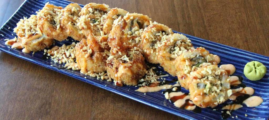 Crunchy Tempura Shrimp Roll · Deep-fried roll with tempura shrimp, avocado, sushi rice, nori, fried onion, spicy mayo and eel sauce.