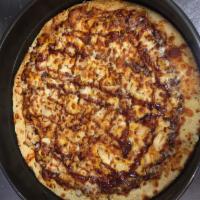 12. BBQ Chicken Pizza · Mixture of cheddar and mozzarella cheese, grilled chicken breast, red onions, topped with ou...