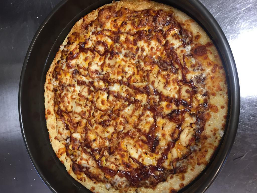 12. BBQ Chicken Pizza · Mixture of cheddar and mozzarella cheese, grilled chicken breast, red onions, topped with our BBQ sauce.