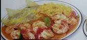 Camarones Rancheros · grilled shrimp mixed in with onion and bell peppers covered in ranchero sauce and served wit...