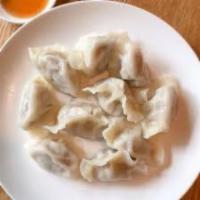 Mul Mandu · 10 pieces. Steamed chicken and vegetable dumpling.
