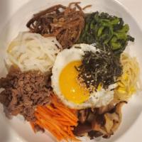 Bibimbop · Steamed rice with beef and assorted vegetables with Korean spicy sauce.