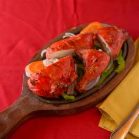 Tandoori Chicken · The supreme of Kabobs - spring chicken marinated in Tandoori masala and yogurt for over 24 h...