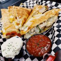 Chicken Quesadilla · Jalapeno, onion, mozzarella and cheddar. Served with a side of sour cream and salsa.