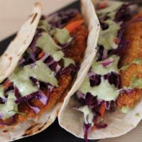 FRIED FISH TACOS ( 2) · Panko crusted white fish, Asian slaw, maui onion, wasabi aji sauce.