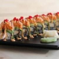 Makana Roll · 8 Pieces of Tempura shrimp topped with avocado, spicy crabmeat and masago.