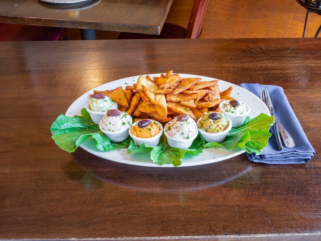 Dips and Chips · All 6 of our traditional spreads served with freshly fried pita chips.