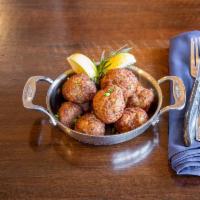 Keftedes · Fried meatballs. Mix pork, beef, and lamb.