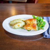 Stuffed Chicken · Chicken breast stuffed with spinach and feta topped with beurre blanc sauce (light cream sau...