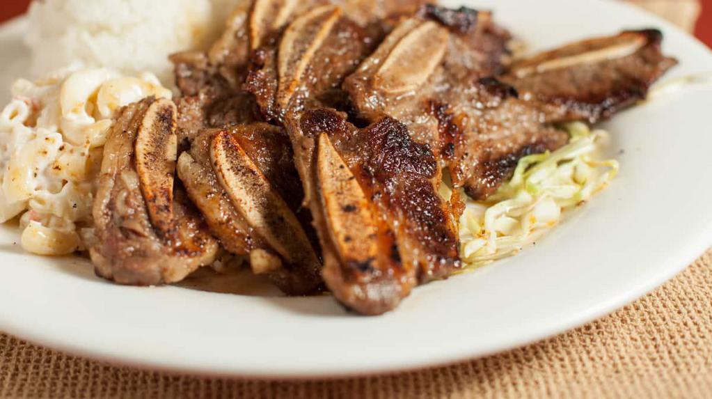 12. BBQ Short Ribs · Juicy beef short ribs marinated in our house teriyaki sauce and grilled to perfection.
