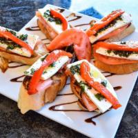 Sicilian Style Appetizer · Freshly sliced mozzarella cheese, fresh basil, tomatoes, and roasted red peppers on toasted ...