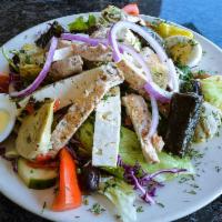 Authentic Greek Salad · Comes with chicken. Feta cheese, stuffed grape leaves, anchovies, artichokes, hard-boiled eg...