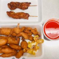 10.宝宝盘 Pu Pu Platter · Egg roll, crab rangoon, fried shrimp, teriyaki chicken, and sweet and sour chicken.
