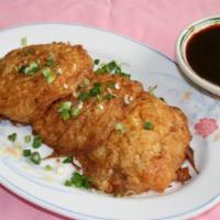 H11. Egg Foo Young · Choice of meat mixed with bean sprouts, white onions and egg, deep fried. Topped with brown ...