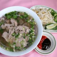 V3. Pho Beef · Rice noodles and tender beef in homemade beef soup.