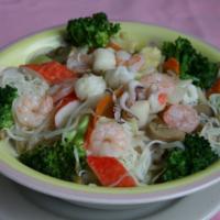 V9. Seafood Rice Noodle Soup · Shrimp, squid and crab meat with vegetables and rice noodles in homemade chicken broth.