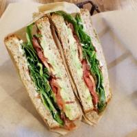 BLTA Sandwich · Bacon, lettuce, tomato, and avocado on white bread. 