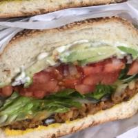 Veggie Burger · organic veggie patty, tomato, lettuce, red onions, pepper jack cheese, mayo, avocado, mustar...