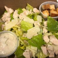 Chicken Caesar Salad · Chicken, Lettuce, housemade garlic croutons, and Parmesan cheese with Caesar Dressing.